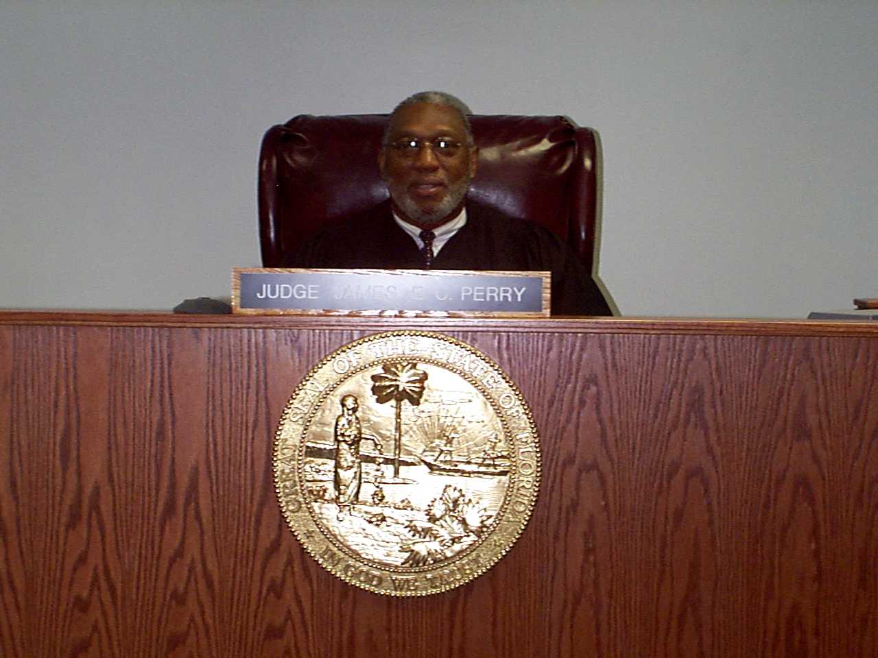 Justice Perry at the judicial bench